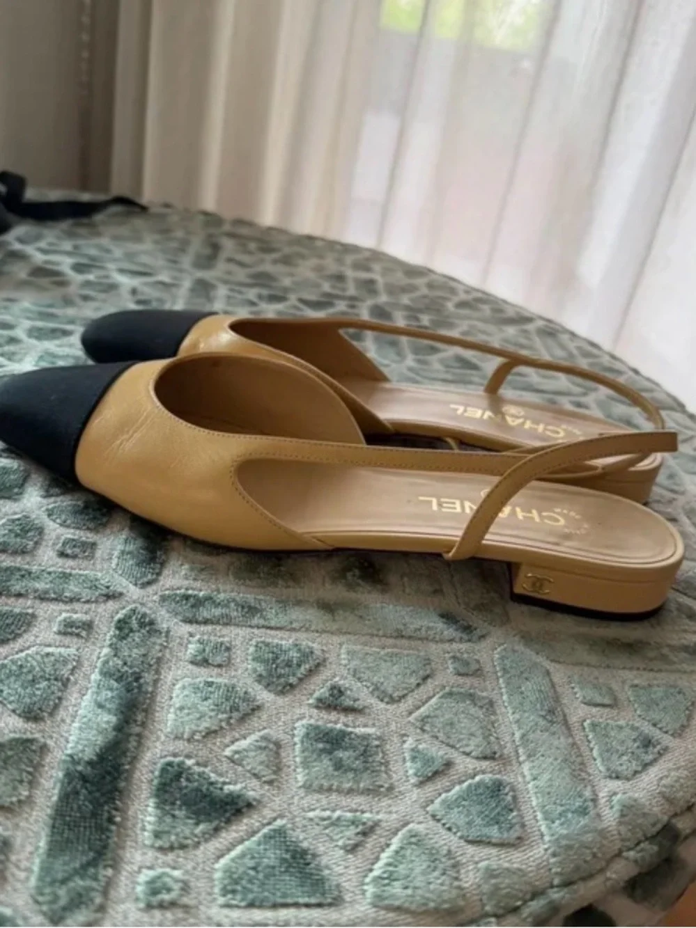 CHANEL Beige Leather Slingback Flats with Black Cap Toe